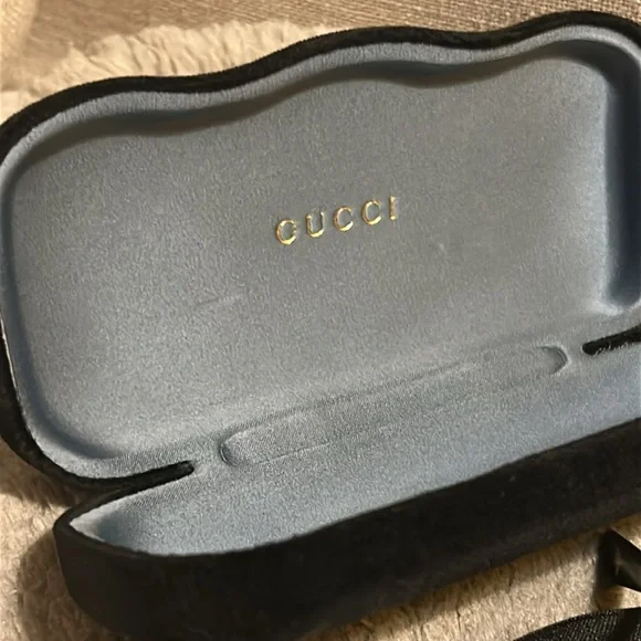 New gucci glasses. Never worn. Authentic. Can provide receipt. Cloth & case. - Picture 8 of 14